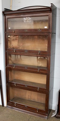 Lot 1110 - A Globe Wernicke Style Oak Five-Tier Stacking...