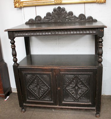 Lot 1115 - An 18th Century Style Oak Buffet, shaped...