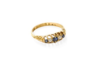 Lot 398 - An 18 Carat Gold Sapphire and Diamond Five...