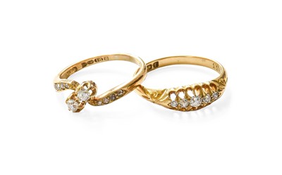 Lot 387 - An 18 Carat Gold Diamond Two Stone Twist Ring,...