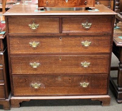 Lot 1327 - A George III Oak Four Height Chest of Drawers,...