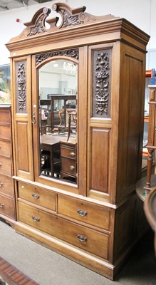 Lot 1127 - A Late Victorian Oak Wardrobe, the moulded...