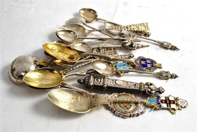 Lot 441 - A small quantity of silver and white metal souvenir spoons, coffee spoons and a plated needle case