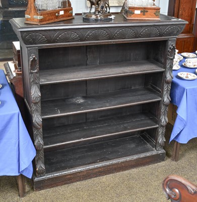 Lot 1164 - A Carved Oak Open Bookcase, circa 1900, carved...