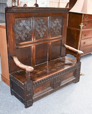 Lot 1186 - An 18th Century Carved Oak High Backed Box...