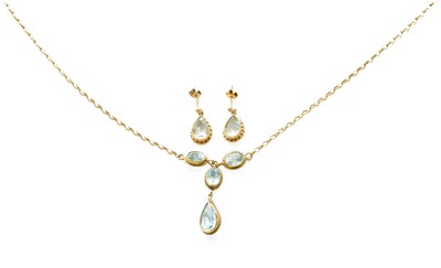 Lot 415 - A 9 Carat Gold Blue Topaz Necklace, two oval...