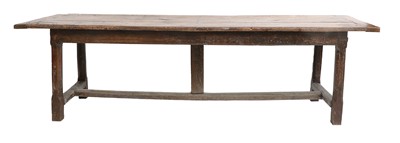 Lot 719 - An Early 18th Century Rustic Oak Dining Table,...