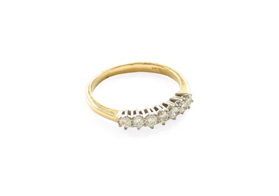 Lot 430 - An 18 Carat Gold Diamond Seven Stone Ring, the...