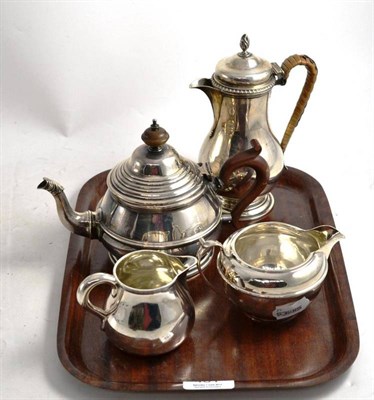 Lot 481 - A composite four piece silver bachelors tea set, various marks