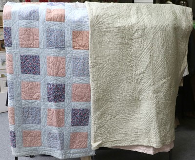 Lot 1105 - An Early 20th Century Patchwork Quilt with...