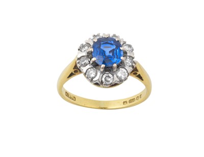 Lot 2197 - An 18 Carat Gold Sapphire and Diamond Cluster...