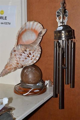 Lot 502 - Conch shell lamp and wall chimes