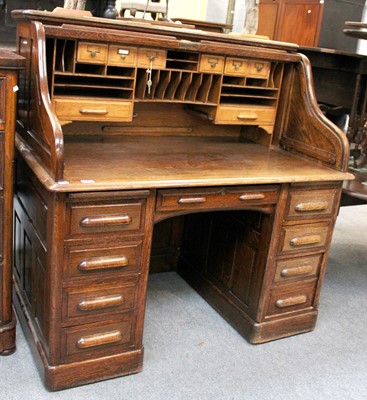 Lot 1241 - An Oak 'Standard' Roll Top Desk, 1920s, fitted...