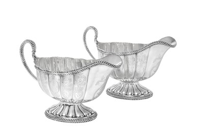 Lot 2035 - A Pair of Victorian Silver Sauceboats
