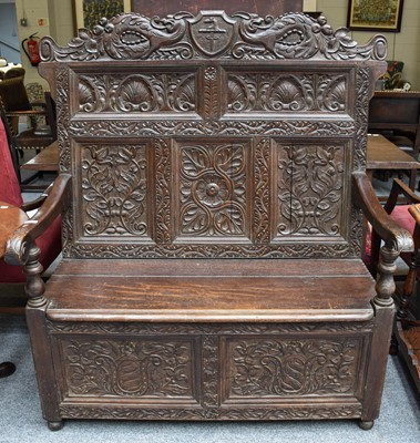 Lot 1191 - An Late/Early 19th Carved High Back Settle,...