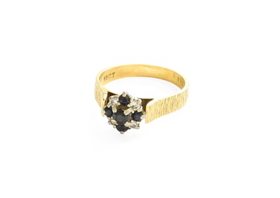 Lot 13 - A Sapphire and Diamond Cluster Ring, the...