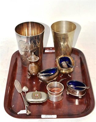 Lot 517 - Silver condiments, silver napkin ring, plated sovereign case, two plated beakers, etc