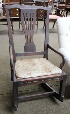 Lot 1162 - A George III Mahogany Rocking Armchair, with...