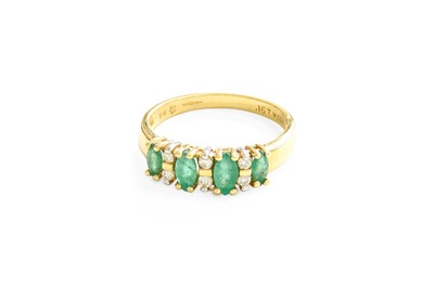 Lot 26 - An 18 Carat Gold Emerald and Diamond Ring,...