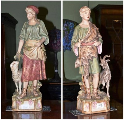 Lot 523 - A large pair of Royal Dux porcelain figures of a shepherd and shepherdess, models 1115 and 1116