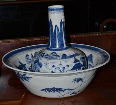 Lot 524 - A 19th century Chinese blue and white basin and water guglet