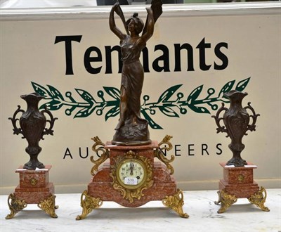 Lot 539 - Three piece spelter clock garniture with pink marble