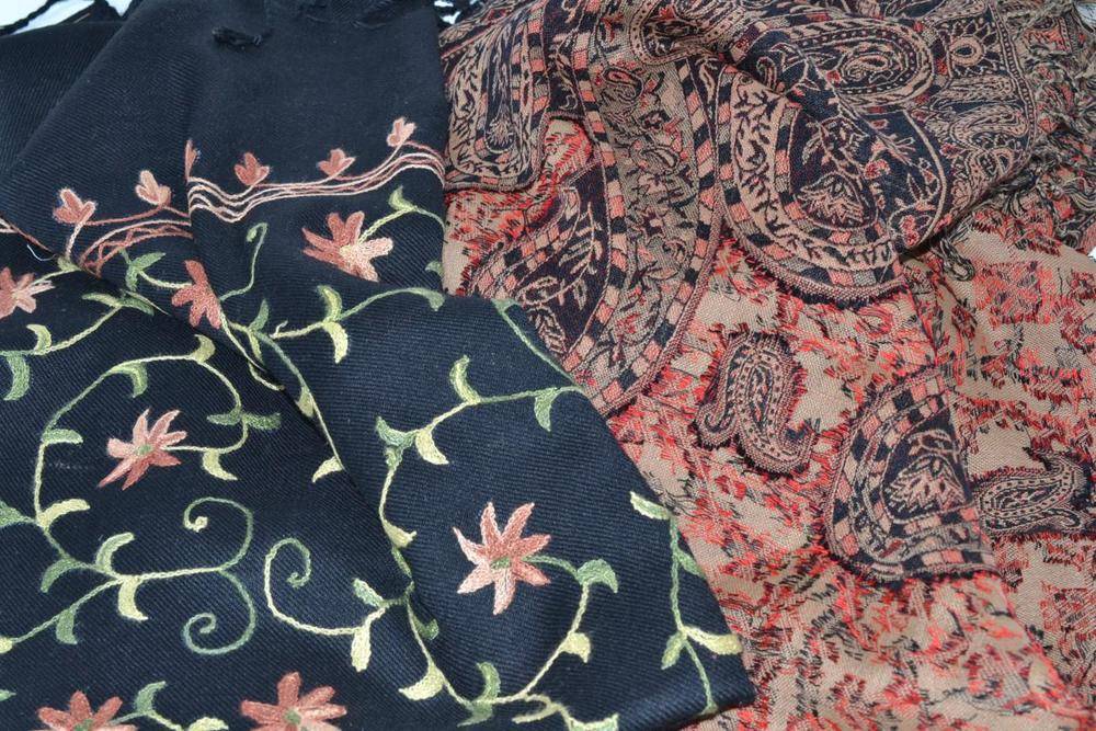 Lot 541 - Woven Jacquard throw and a Kashmir black wool embroidered shawl (2)
