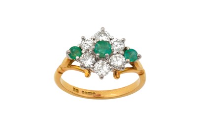 Lot 2120 - An 18 Carat Gold Emerald and Diamond Cluster...