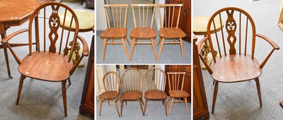 Lot 1367 - A Set of Five Ercol Elm Hoop Back Dining...