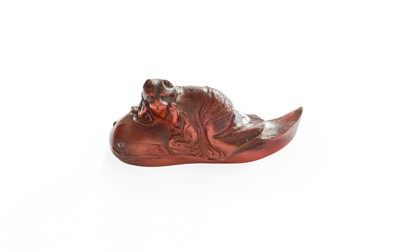 Lot 344 - A Japanese Carved Amber Netsuke, late Meiji,...