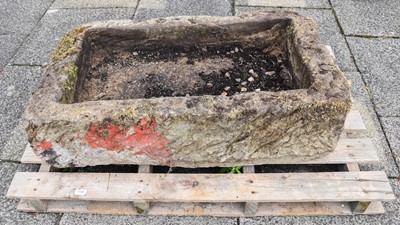 Lot 1150 - A Shallow Rectangular Weathered Stone Trough,...