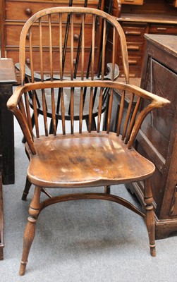 Lot 1252 - An Early 20th Century Elm Windsor Chair, with...