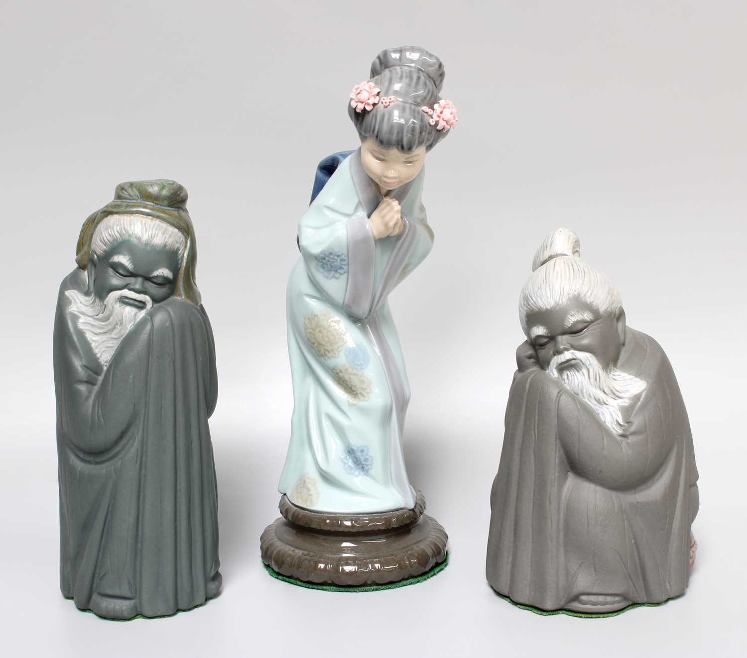 Lot 275 - A Lladro Figure of a Japanese Woman, 26cm high;...