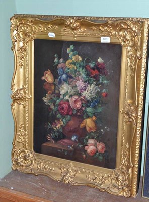 Lot 603 - A 19th century oil on canvas still life of a display of flowers, in a gilt frame