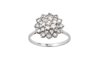 Lot 2078 - A Diamond Cluster Ring the domed cluster set...