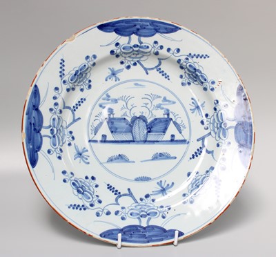 Lot 155 - An 18th Century English Delft Charger,...