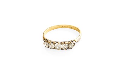 Lot 333 - A Diamond Five Stone Ring, the graduated old...