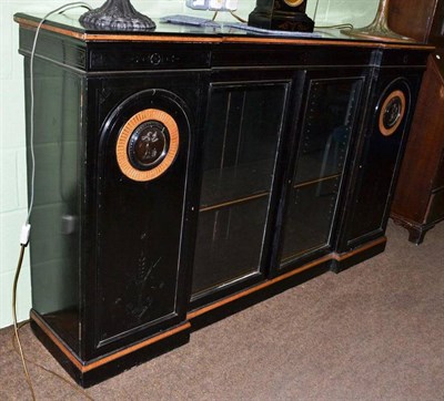 Lot 638 - Ebonised credenza