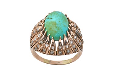 Lot 2134 - A Turquoise and Diamond Cluster Ring the oval...