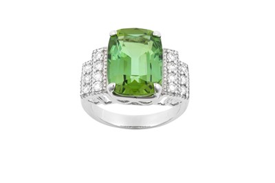 Lot 2251 - A Tourmaline and Diamond Ring the cushion cut...