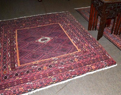 Lot 642 - Afghan piled and flatweave rug of unusual size, Afghan Turkestan, the diamond lattice field...