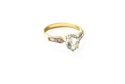 Lot 301 - An 18 Carat Gold Aquamarine Ring, the oval cut...