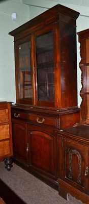 Lot 648 - A Victorian mahogany cabinet with later bookcase top