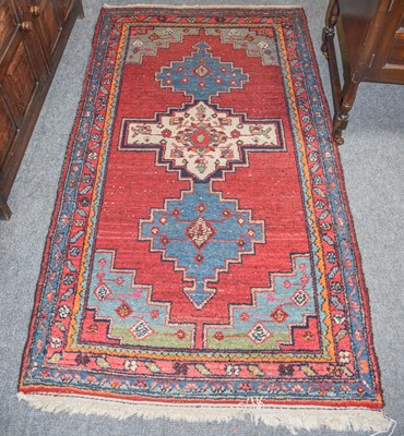 Lot 1024 - Hamadan Rug, the blood red field with three...