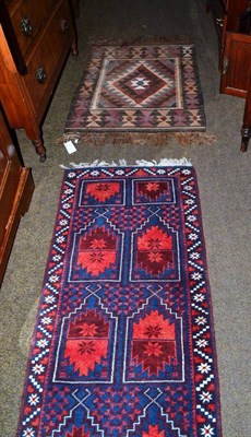 Lot 652 - Narrow Balouch runner, Persian/Afghan frontier, the compartmentalised field enclosed by narrow...