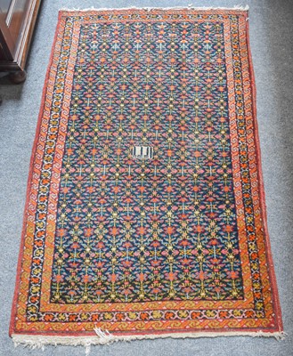 Lot 1026 - North West Persian Rug, the deep indigo field...