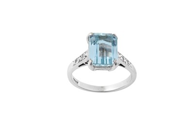 Lot 2101 - An Aquamarine and Diamond Ring the emerald-cut...