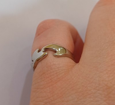Lot 2069 - An 18 Carat White Gold Fusion Ring, designed...