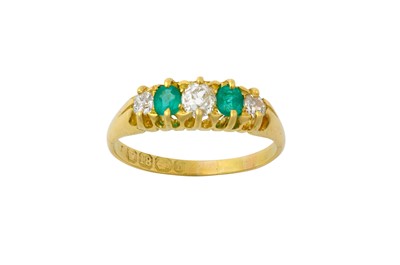 Lot 2154 - An 18 Carat Gold Emerald and Diamond Five...