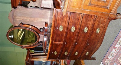 Lot 671 - A Regency mahogany bow fronted chest of drawers and a toilet mirror